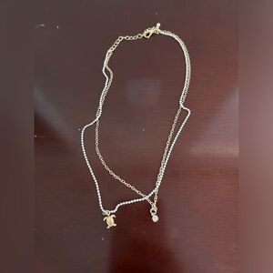 Dainty gold choker with small sea turtle and rhinestone pendants